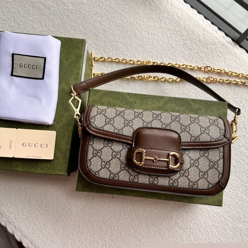 G*u*i top handle bags